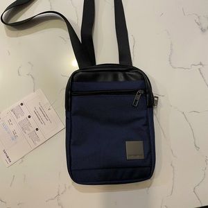 Samsonite NWT cross body bag with warranty